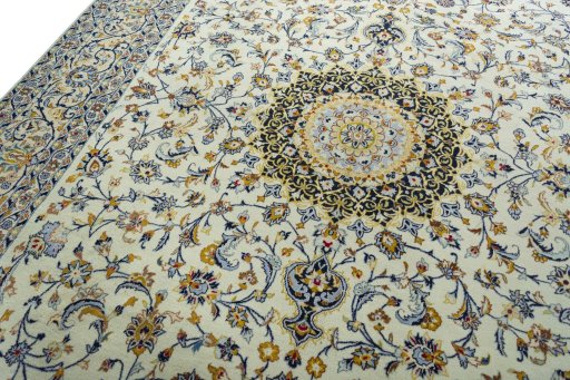 Backside of handmade 2000s Kashmar rug showing knot structure and weave density