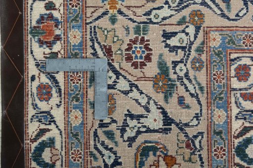 Backside of handmade 2000s Kashmar rug showing knot structure and weave density