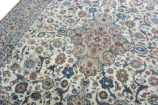 Backside of handmade 2000s Kashmar rug showing knot structure and weave density