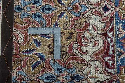 Backside of handmade 1970s Kashmar rug showing knot structure and weave density