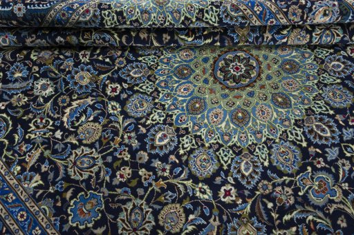 Close-up detail of 2000s Kashmar rug from Iran / Persia showing Wool weave