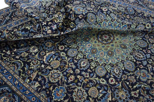 Surface texture of 2000s Kashmar rug with natural Wool and intricate pattern