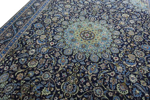 Backside of handmade 2000s Kashmar rug showing knot structure and weave density