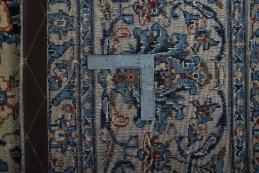 Backside of handmade 2000s Kashmar rug showing knot structure and weave density