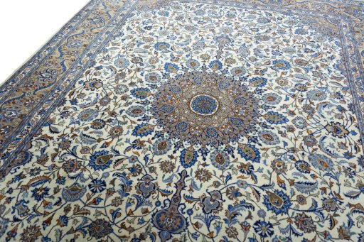 Backside of handmade 2000s Kashmar rug showing knot structure and weave density