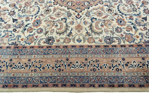Corner detail of 1970s Kashmar rug showing border pattern and Wool pile