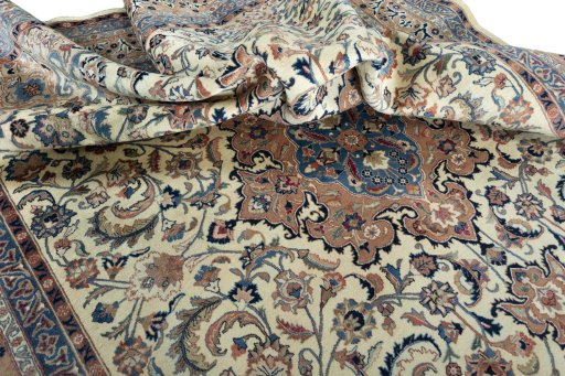 Surface texture of 1970s Kashmar rug with natural Wool and intricate pattern