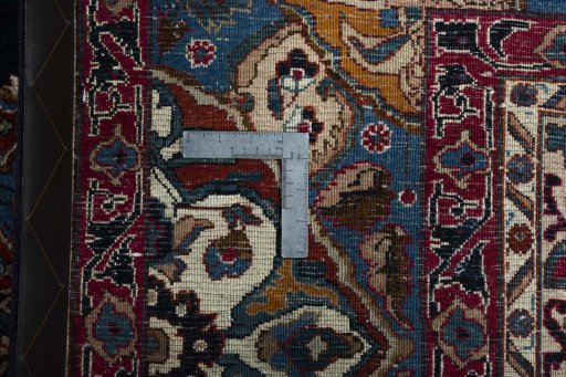 Backside of handmade 2000s Kashmar rug showing knot structure and weave density