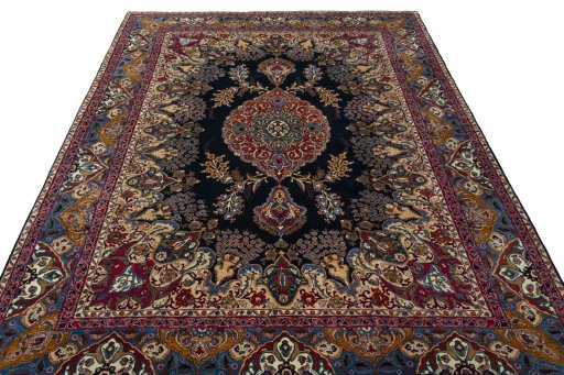 Surface texture of 2000s Kashmar rug with natural Wool and intricate pattern