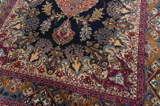 Close-up detail of 2000s Kashmar rug from Iran / Persia showing Wool weave
