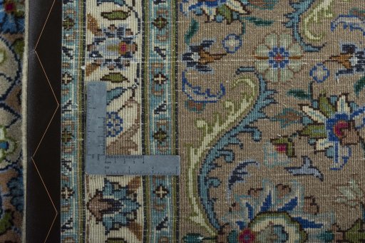 Backside of handmade 2000s Kashmar rug showing knot structure and weave density