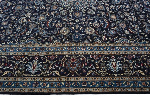Corner detail of New Kashmar rug showing border pattern and Wool pile