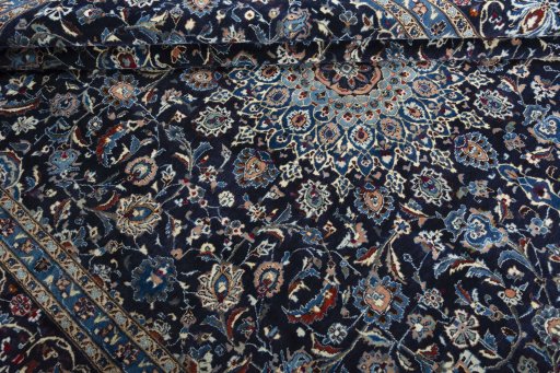 Close-up detail of New Kashmar rug from Iran / Persia showing Wool weave