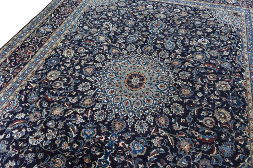 Backside of handmade New Kashmar rug showing knot structure and weave density