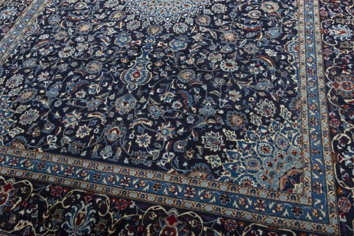Close-up detail of New Kashmar rug from Iran / Persia showing Wool weave