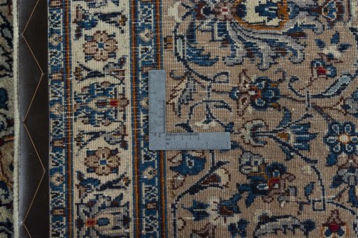 Backside of handmade 2000s Kashmar rug showing knot structure and weave density