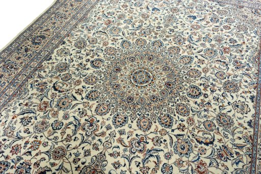 Backside of handmade 2000s Kashmar rug showing knot structure and weave density