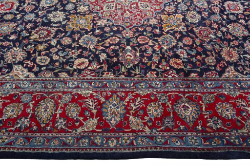 Corner detail of 2000s Kashmar rug showing border pattern and Wool pile