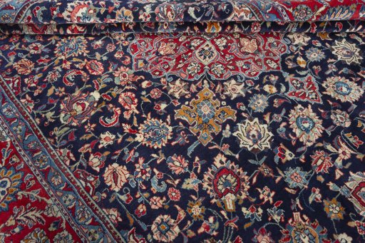 Close-up detail of 2000s Kashmar rug from Iran / Persia showing Wool weave