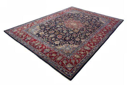 Corner detail of 2000s Kashmar rug showing border pattern and Wool pile
