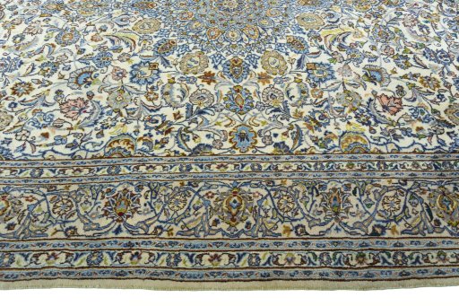 Corner detail of 2000s Kashmar rug showing border pattern and Wool pile