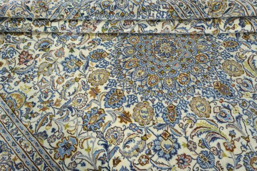 Close-up detail of 2000s Kashmar rug from Iran / Persia showing Wool weave