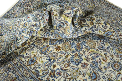 Surface texture of 2000s Kashmar rug with natural Wool and intricate pattern
