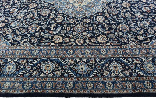 Corner detail of 2000s Kashmar rug showing border pattern and Wool pile