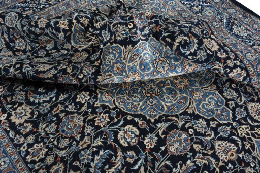 Surface texture of 2000s Kashmar rug with natural Wool and intricate pattern
