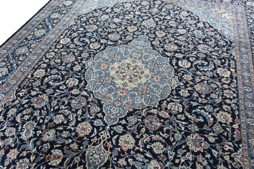 Backside of handmade 2000s Kashmar rug showing knot structure and weave density