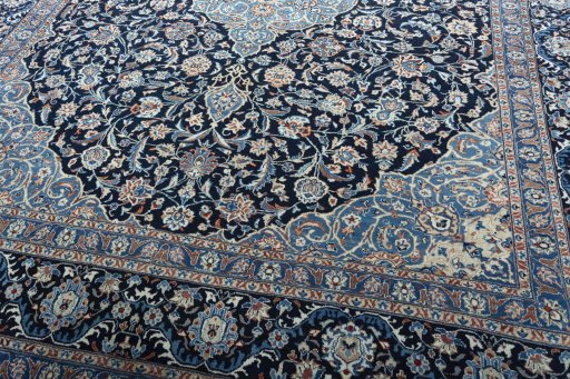 Close-up detail of 2000s Kashmar rug from Iran / Persia showing Wool weave