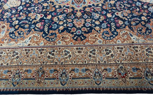 Corner detail of 1970s Kashmar rug showing border pattern and Wool pile