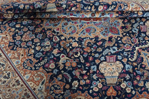 Close-up detail of 1970s Kashmar rug from Iran / Persia showing Wool weave