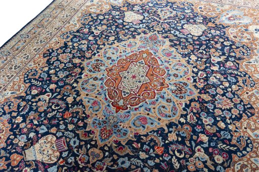 Backside of handmade 1970s Kashmar rug showing knot structure and weave density