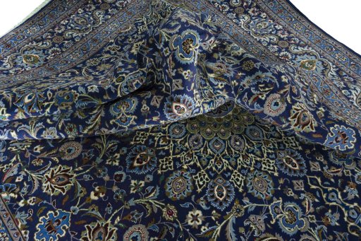 Surface texture of 2000s Kashmar rug with natural Wool and intricate pattern