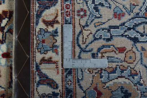 Backside of handmade 2000s Kashmar rug showing knot structure and weave density