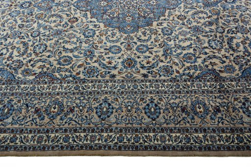 Corner detail of 2000s Kashmar rug showing border pattern and Wool pile
