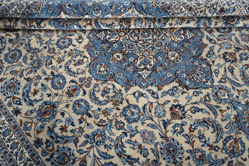 Close-up detail of 2000s Kashmar rug from Iran / Persia showing Wool weave