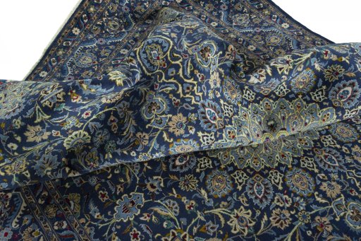 Surface texture of 2000s Kashmar rug with natural Wool and intricate pattern
