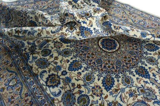 Surface texture of 2000s Kashmar rug with natural Wool and intricate pattern