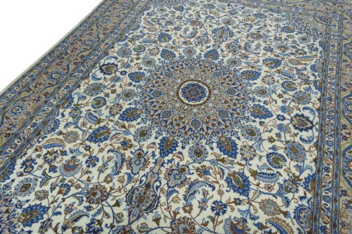 Backside of handmade 2000s Kashmar rug showing knot structure and weave density