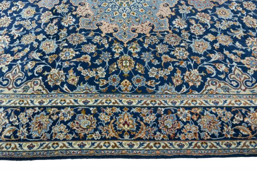 Corner detail of 2000s Kashmar rug showing border pattern and Wool pile