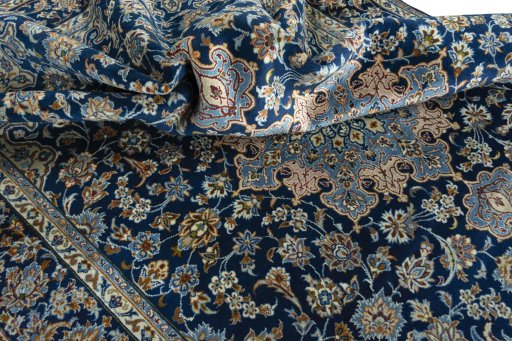 Surface texture of 2000s Kashmar rug with natural Wool and intricate pattern