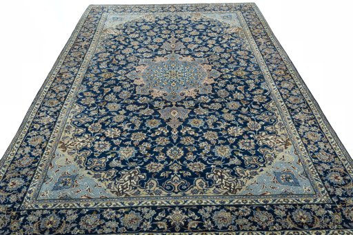 Surface texture of 2000s Kashmar rug with natural Wool and intricate pattern