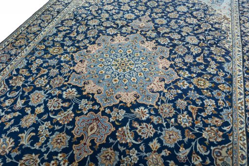 Backside of handmade 2000s Kashmar rug showing knot structure and weave density