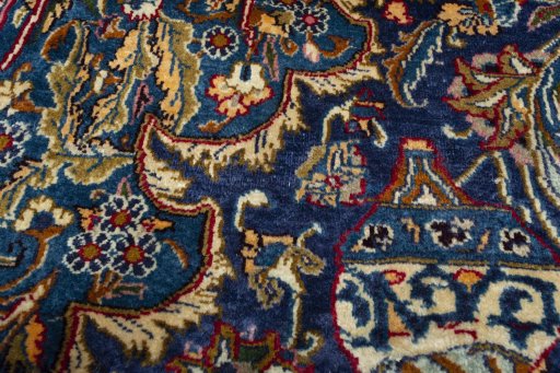 Close-up detail of 2000s Kashmar rug from Iran / Persia showing Wool weave