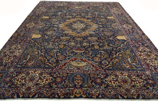 Surface texture of 2000s Kashmar rug with natural Wool and intricate pattern