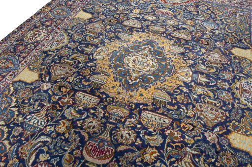 Backside of handmade 2000s Kashmar rug showing knot structure and weave density
