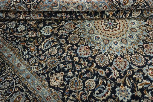 Close-up detail of 2000s Kashmar rug from Iran / Persia showing Wool weave