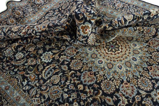 Surface texture of 2000s Kashmar rug with natural Wool and intricate pattern